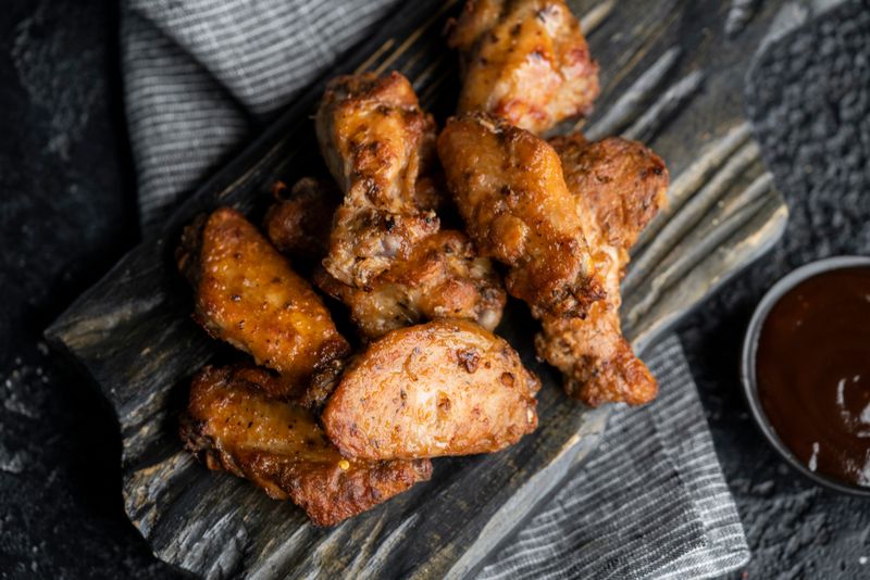 Coal fired wings with dipping sauce