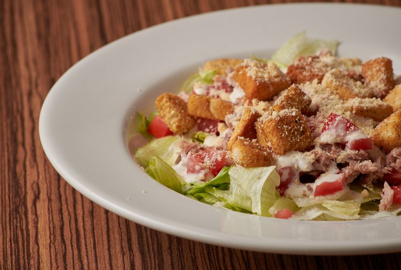Classic Caesar salad with parmesan and croutons