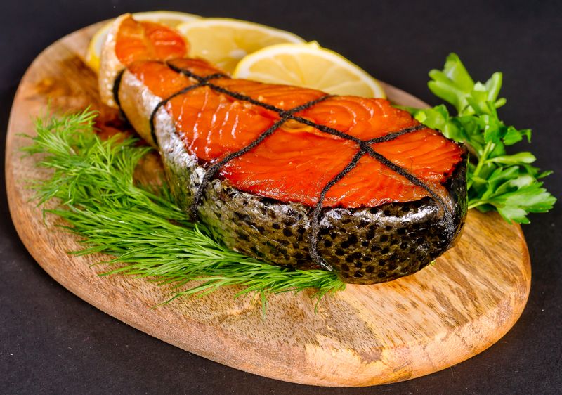 Grilled salmon with lemon herb sauce
